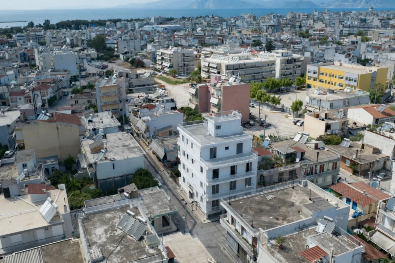 Drone photo of the existing MVR 19 building in its Patras neighbourhood